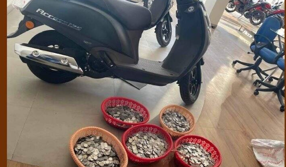 Netizens cheer as Assam man buys scooter with a sack full of savings in coins
